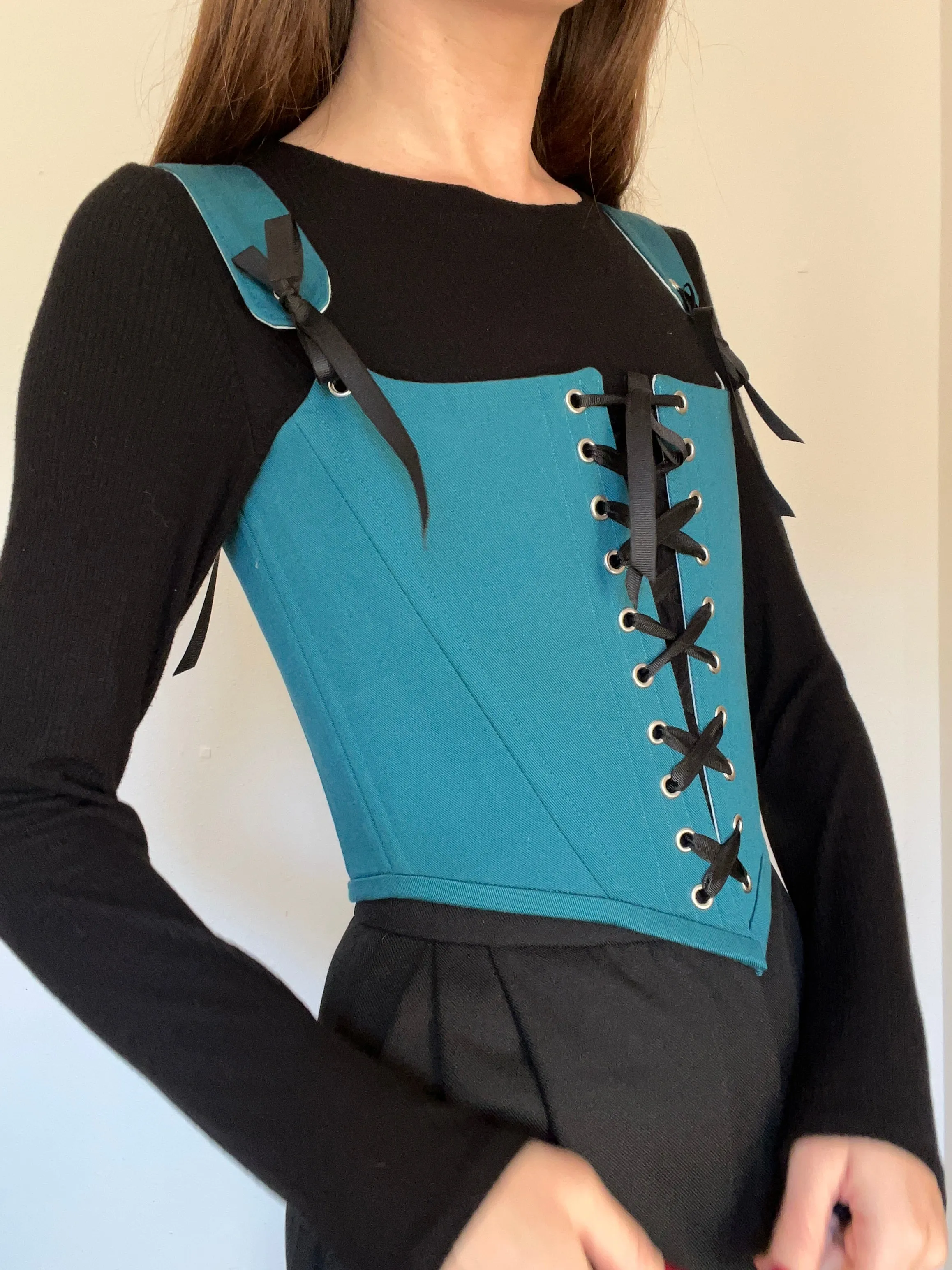 Teal corset with front and back ties, removable shoulder straps,